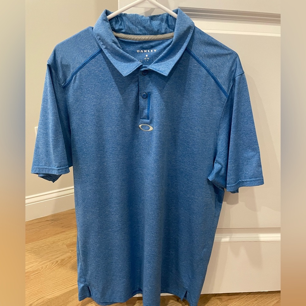 Oakley Hydrolix golf shirt. polyester/Spandex and moisture wicking